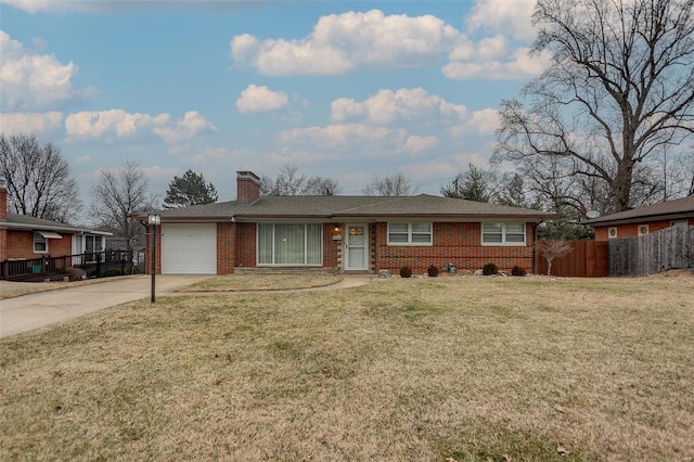 single story home featuring a garage and a front yard