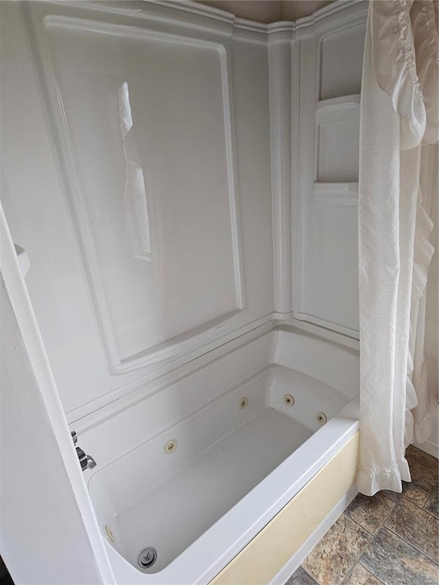 bathroom featuring shower / tub combo