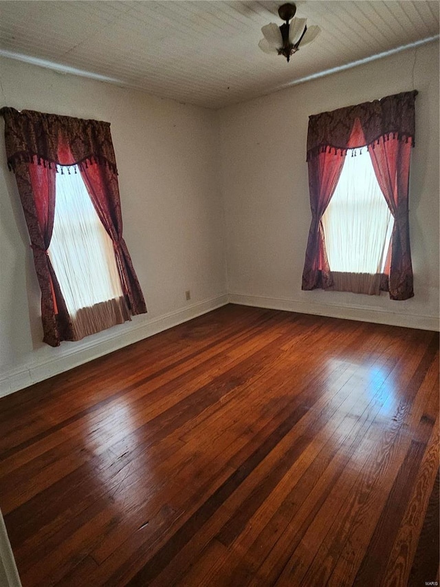 empty room with wood-type flooring