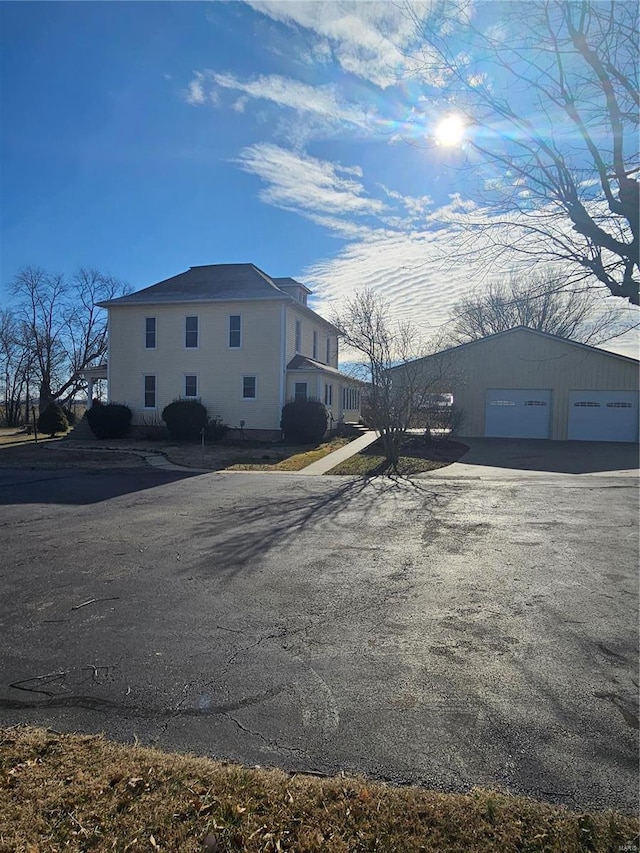 view of property exterior with a garage