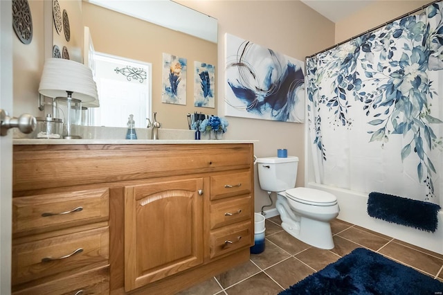 full bath featuring toilet, shower / tub combo with curtain, vanity, and tile patterned floors