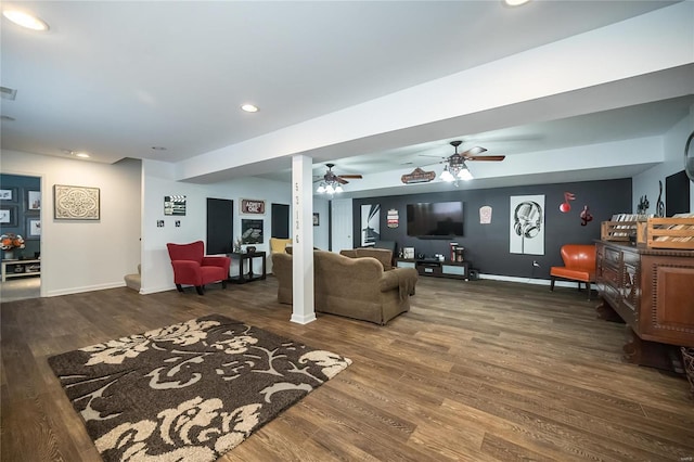 living area with recessed lighting, dark wood-style flooring, visible vents, and baseboards