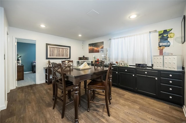 dining space featuring dark wood-style floors, baseboards, and recessed lighting