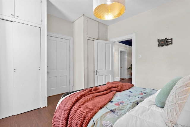 bedroom featuring wood finished floors