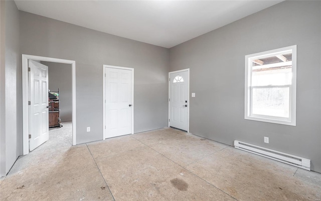 foyer featuring a baseboard radiator