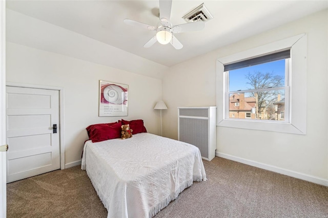 bedroom featuring ceiling fan, carpet floors, visible vents, and baseboards