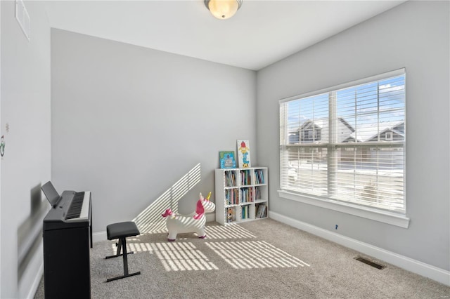 playroom with visible vents, carpet, and baseboards