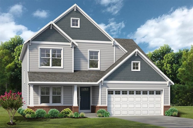 craftsman-style home with driveway, a shingled roof, a front lawn, and brick siding