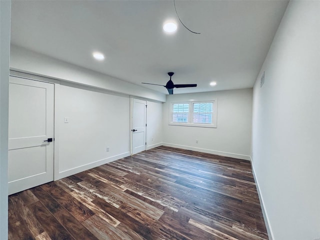 unfurnished bedroom with recessed lighting, dark wood finished floors, a ceiling fan, and baseboards