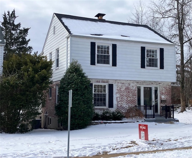 view of front of home with brick siding