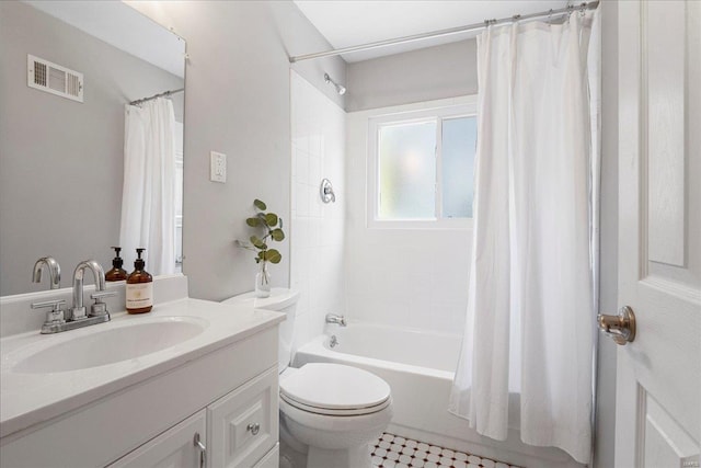 full bathroom with visible vents, shower / bath combination with curtain, vanity, and toilet