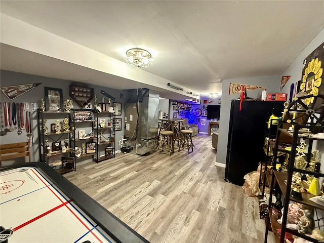 game room featuring hardwood / wood-style flooring