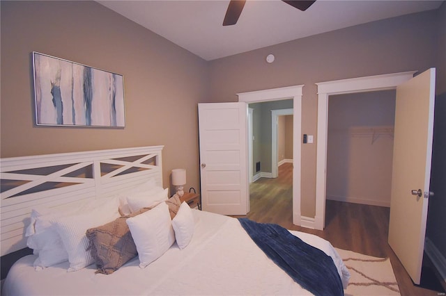 bedroom with baseboards, a closet, a ceiling fan, and wood finished floors