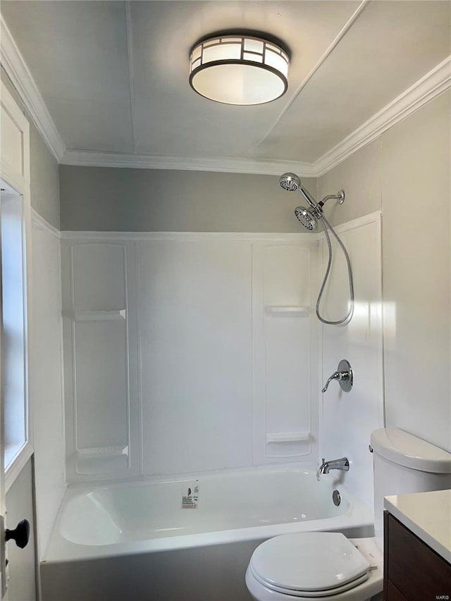 full bath with bathtub / shower combination, ornamental molding, toilet, and vanity