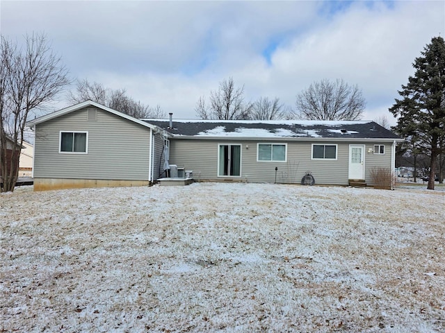 view of snow covered house