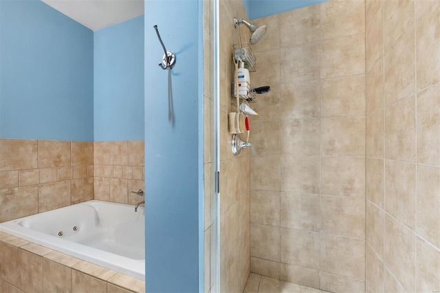 full bath featuring tiled shower and a whirlpool tub