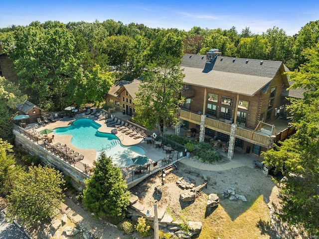 view of swimming pool with a patio