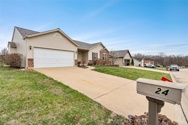 single story home featuring concrete driveway, an attached garage, brick siding, and a front yard