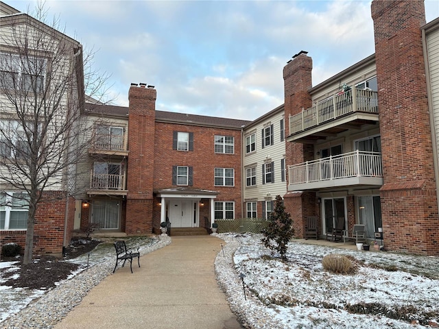 view of snow covered building