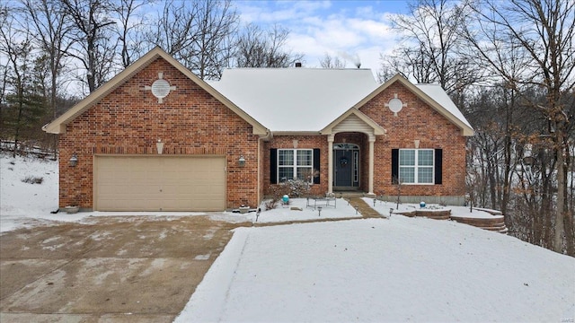 view of front of property featuring a garage