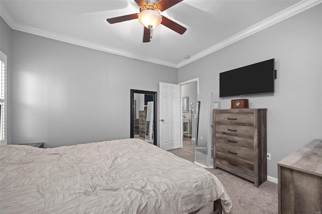 bedroom featuring ornamental molding, light carpet, ceiling fan, and baseboards