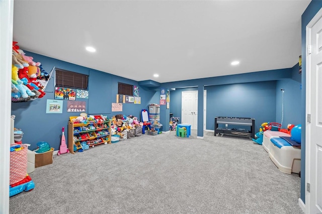 recreation room featuring carpet floors, recessed lighting, and baseboards