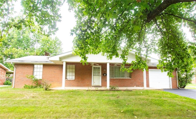 ranch-style house with a garage and a front yard