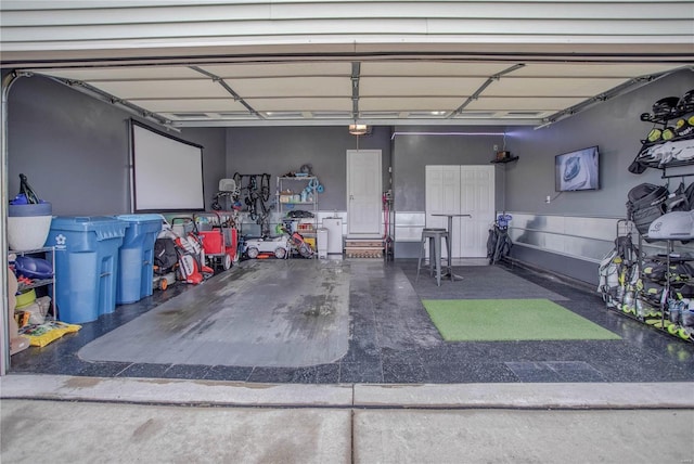 garage featuring a garage door opener