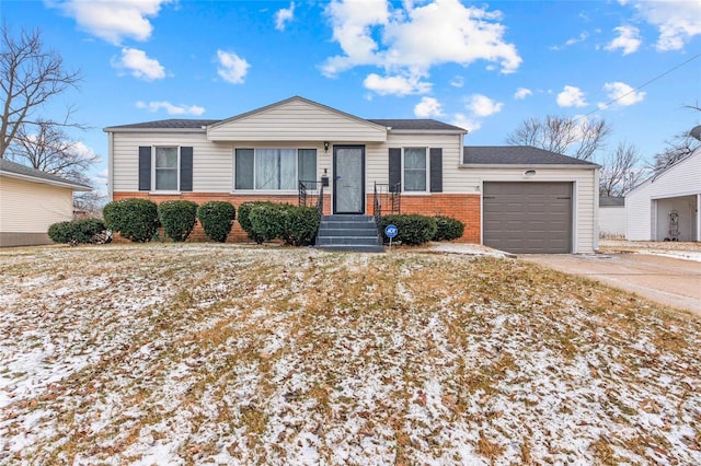 view of front of home featuring an attached garage, driveway, and brick siding