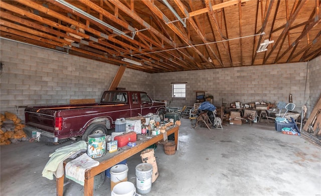 garage featuring concrete block wall