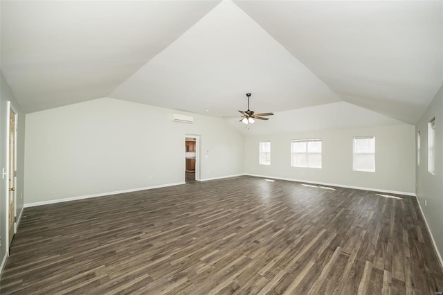 unfurnished living room with dark wood-type flooring, lofted ceiling, baseboards, and a ceiling fan