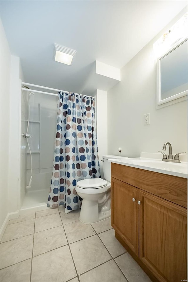 full bath featuring toilet, a shower with curtain, vanity, and tile patterned floors