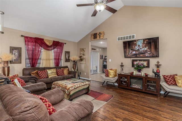 living room with high vaulted ceiling, dark hardwood / wood-style floors, and ceiling fan