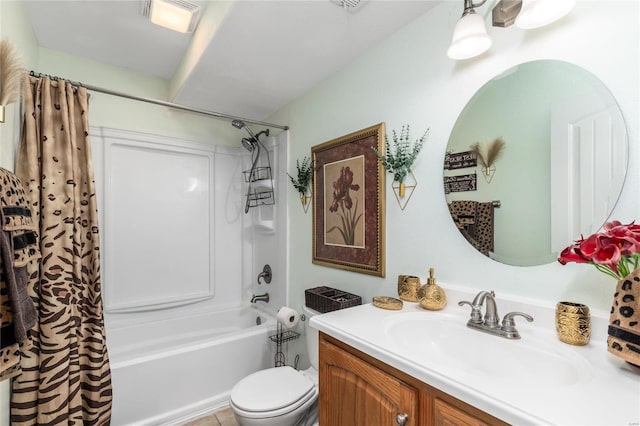 full bathroom with shower / tub combo, vanity, and toilet