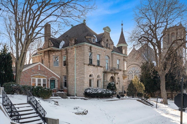 view of front of home with brick siding