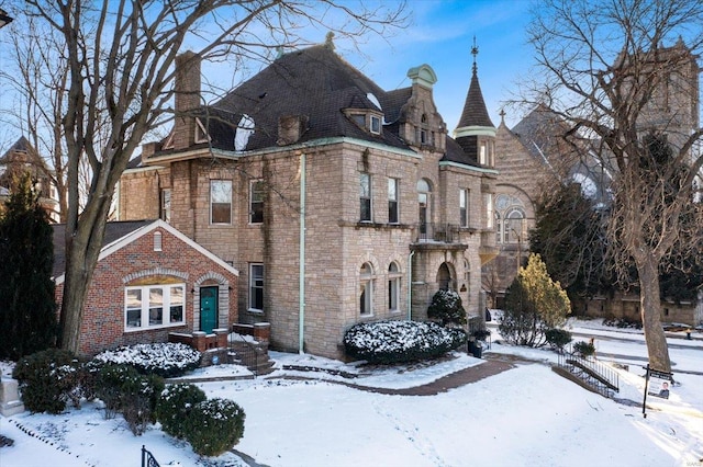 view of front of home with a chimney