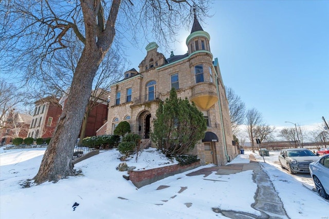 view of snow covered property