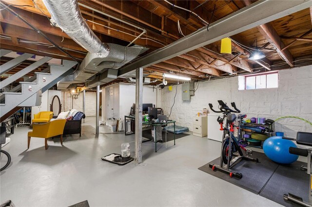 workout room featuring electric panel