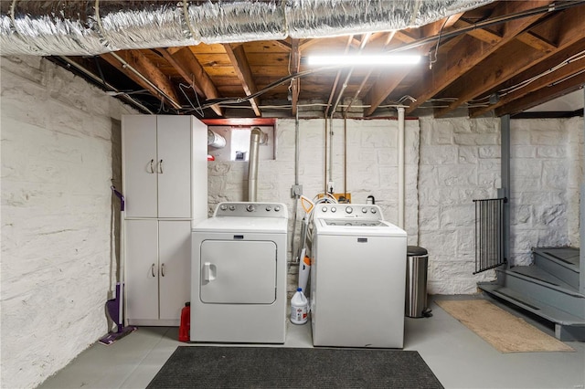 laundry area with independent washer and dryer