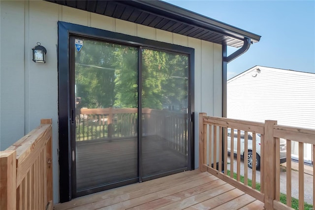 entrance to property with a deck