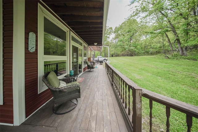deck featuring a yard