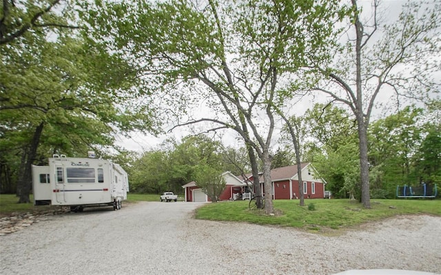 view of dirt / gravel driveway