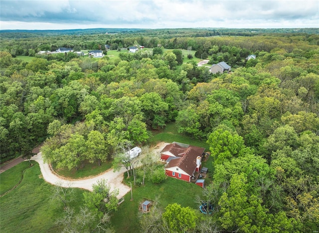 drone / aerial view of a heavily wooded area