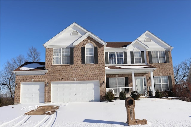 view of front of home featuring a porch and brick siding