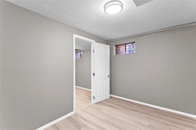 spare room with light wood-type flooring