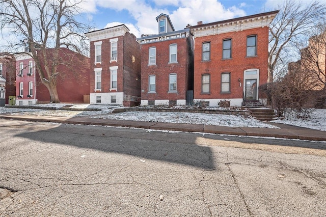 view of snow covered property