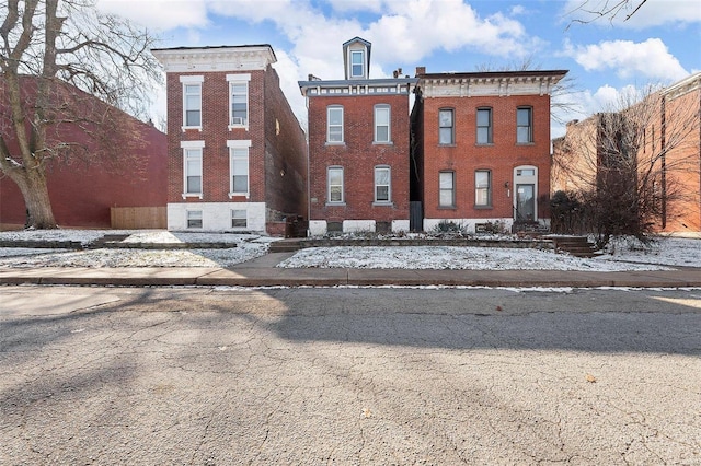 view of snow covered property