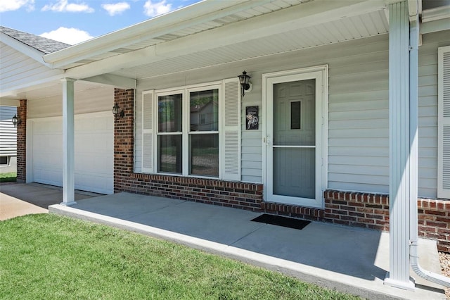 property entrance with a garage