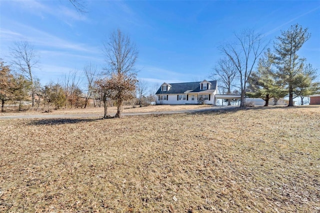 exterior space with a front yard