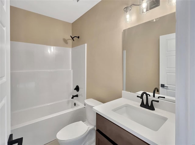 full bathroom with toilet, bathing tub / shower combination, and vanity